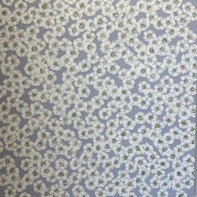 a mixed media piece on canvas of white flowers with gold centers scattered on a muted periwinkle background