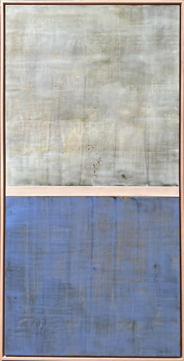 an encaustic piece where the top half is a dusty blue gray and the bottom half is a dusty cornflower blue. the two halves are divided by a thin band of pale beige. the piece is titled "one of those days" which seems a bit melancholy, as shown by the colors used.