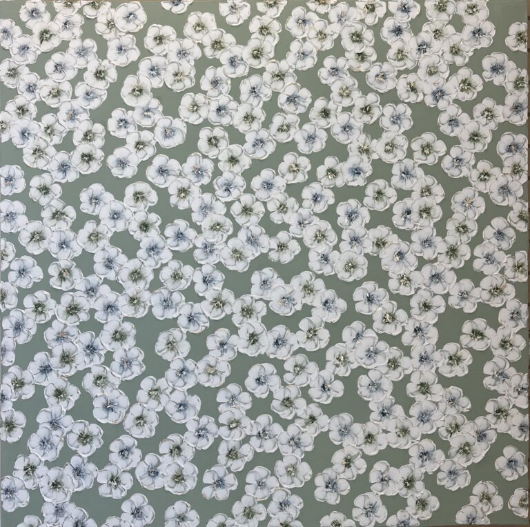 a mixed media piece on canvas of white flowers with olive and blue centers scattered on an olive green background