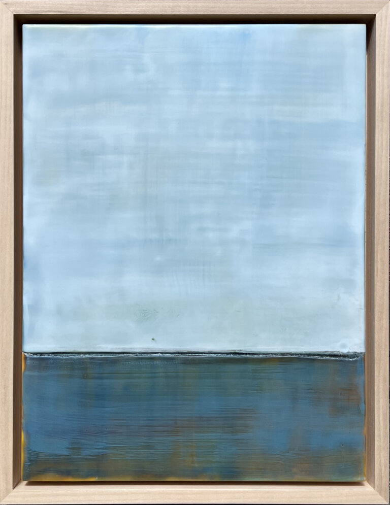 an encaustic piece where the top 2/3 is an emotive shade of sky blue and the bottom 1/3 is deep indigo with a sepia tint