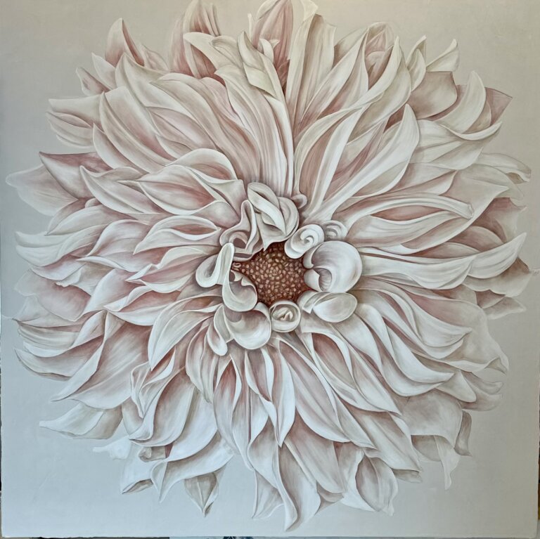 a large pink and white blossom with a dark peach center on a pale background