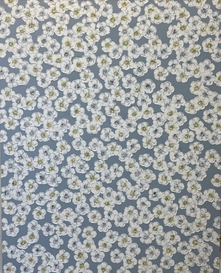 a mixed media piece on canvas of white flowers with green and blue centers scattered on a slate gray blue background