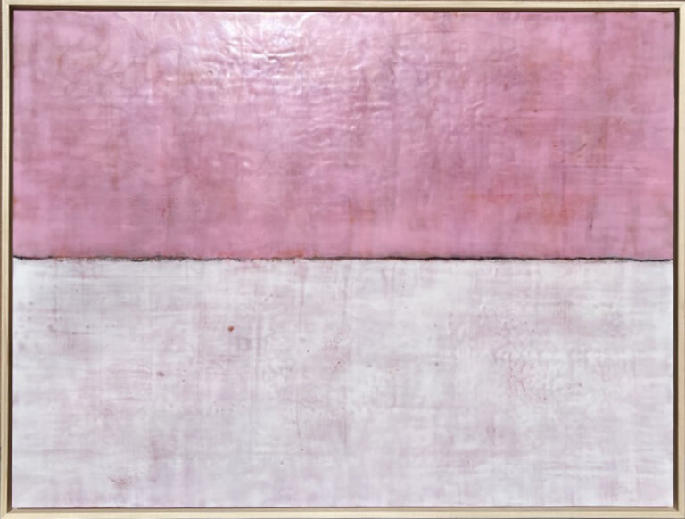 an encaustic piece where the top half is a bubblegum pink and the bottom half is a paler cooler pink