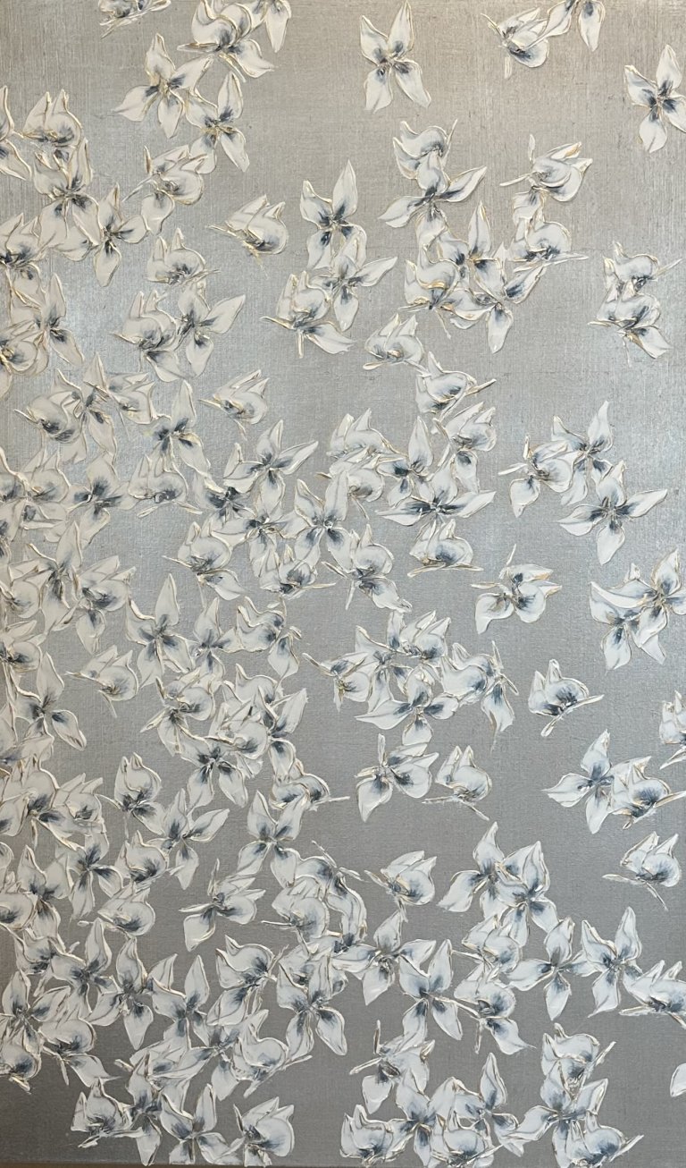 a mixed media piece on canvas of white petal-like butterflies with gray blue centers scattered on a metallic silver background