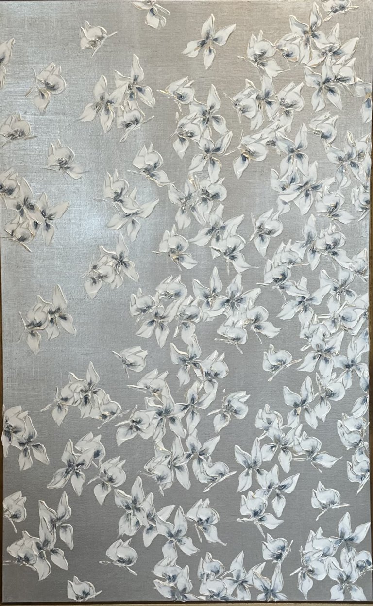 a mixed media piece on canvas of white petal-like butterflies with gray blue centers scattered on a metallic silver background
