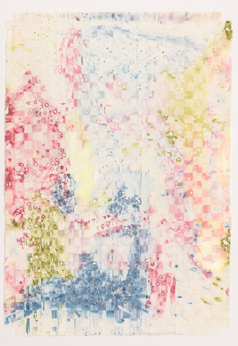 an abstract silkscreen piece on paper created with washes of indigo, sap green, and a brilliant cool-toned red. there are large chunks of each color throughout the piece. the original art piece has been divided into horizontal and vertical strips and woven back together to create a new piece while retaining the original beauty of the first design
