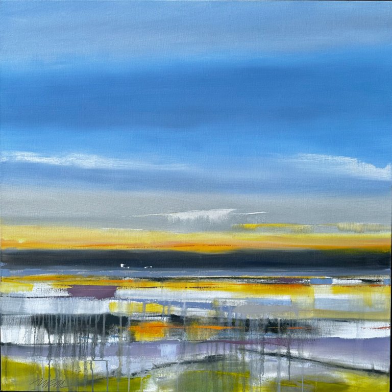 an abstract landscape piece with a wide blue sky and a few wispy clouds. on the horizon there is a hazy dark landmass beneath the beginning of a sunset in red and orange. the sunset is reflected in the water in the foreground. around the water there are purple rocks and green land.