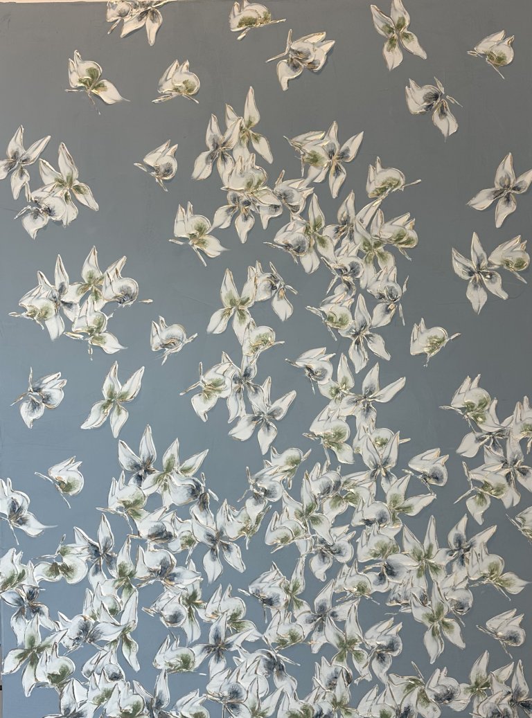 an abstract art piece featuring a flood of butterflies in white with lime green and indigo centers against a flat slate blue background