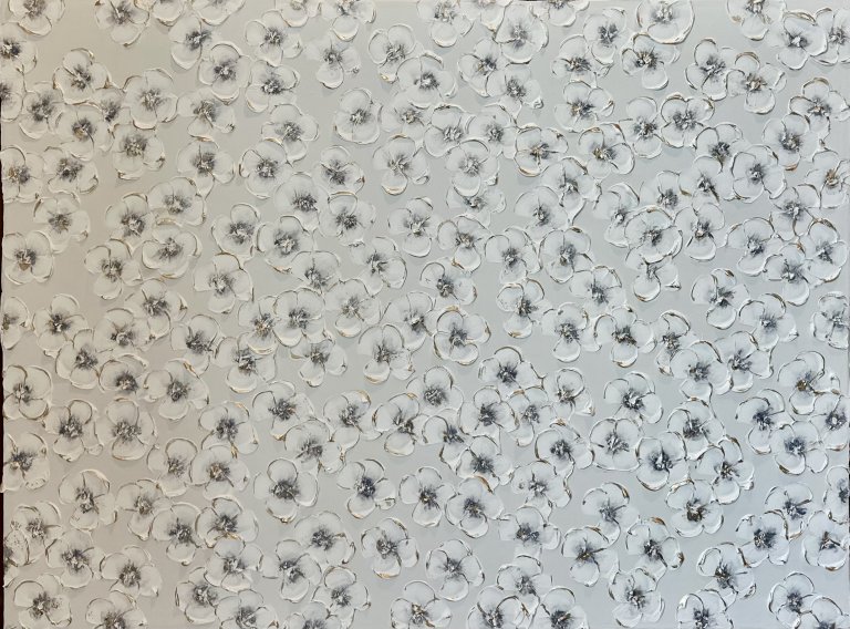 an abstract art piece featuring a pattern of round white blossoms with slate gray centers. the background behind the flowers is an off-white color