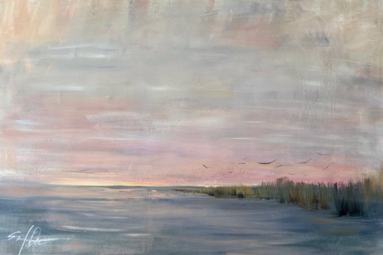an abstracted landscape of the horizon line between a calm blue gray sea and a soft cloudy sunset sky with a coral and pink sunset. along the horizon to the right is a little strip of land with green, red, and gray reeds and grasses. above the land a small flock of birds rise up in flight