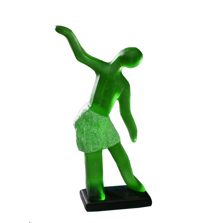 a hand-cast glass sculpture in ming green. the sculpture is a dancer standing with both arms extended, one raised up to the left and the other lowered down to the right, towards the figure's right foot which is also extended. the figure inclines her head to the right. the figure is wearing a skirt, differentiated from the rest of the body by shape and texture. the skirts texture is rough, while the rest of the body is smooth