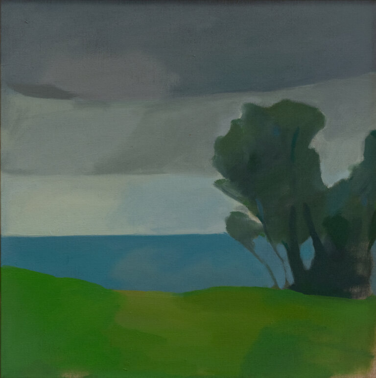 an abstracted landscape of a green hill that drops off into a blue body of water under a pale sky with dark gray clouds. at the right of the piece there is a clump of dark gray-green trees. every piece of this landscape is abstracted to shapes, so it has a figurative, loose feel