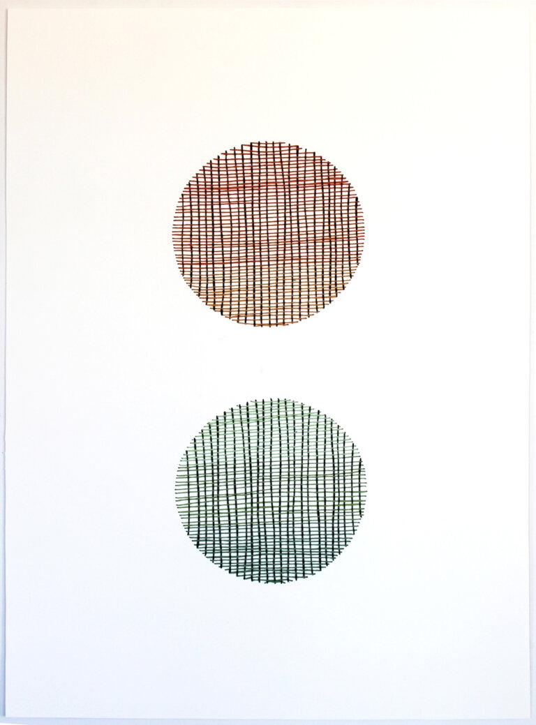 an abstract woven piece on paper created by thread embroidered on paper. the thread is embroidered in perpendicular lines that create two circles, one above the other. the threads in the top circle are orange, red, and black. the threads in the bottom circle are green and black