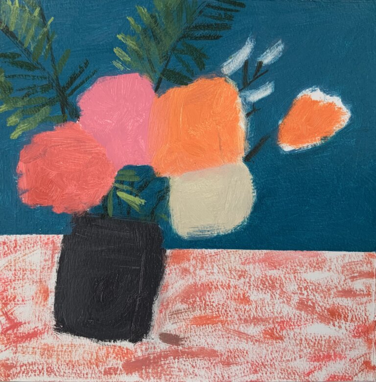 a simplified still life with a table with a pink, white, and coral tablecloth in front of a teal blue wall. on the table is a black jar holding greenery and red, pink, orange, and white flowers