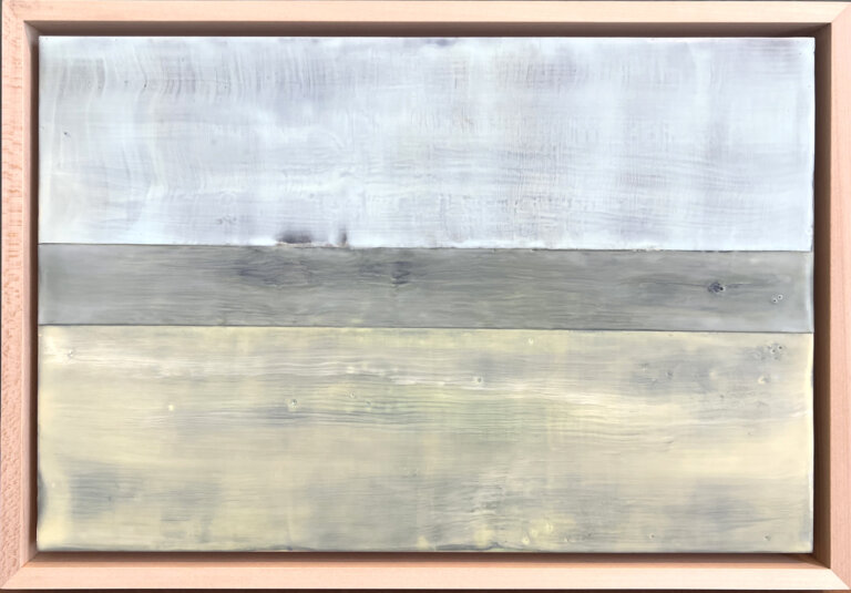 an abstract color block encaustic art piece with three horizontal color blocks. the top is pale blue, the middle is a gray and taupe blend, and the bottom is olive and pale yellow