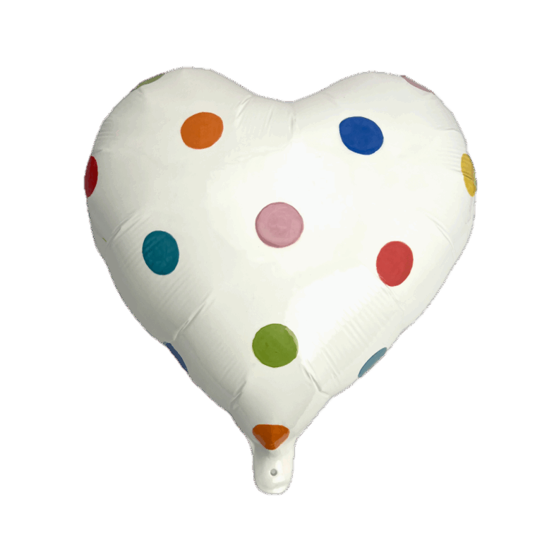 a photo of a ceramic piece shaped like a mylar balloon heart in white with multicolored polka dots in shades of red, orange, deep blue, pink, yellow, green, and aqua.