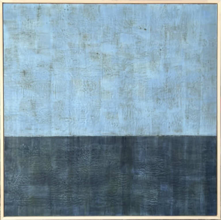 an abstract encaustic piece that is divided horizontally into two sections. the top section is sky blue, and the bottom is deep indigo blue.