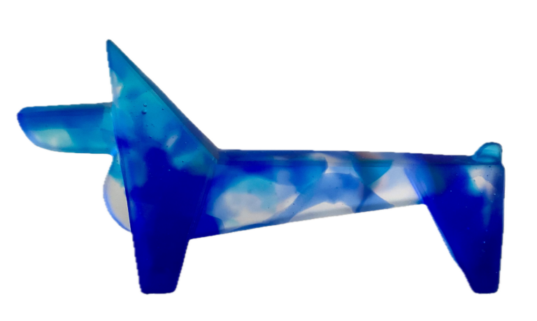 a hand cast blue and clear glass interpretation of a corgi