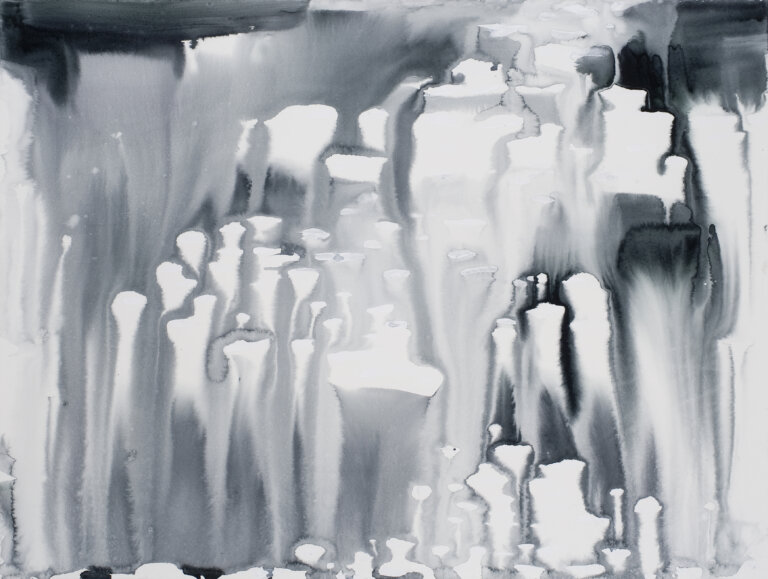 abstract black and white piece of sunlight reflecting of a mountain lake