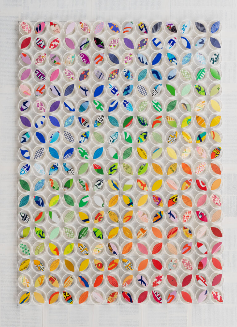 collage of white condiment cups with multi colored candy box petal shaped cut outs on top of the cups