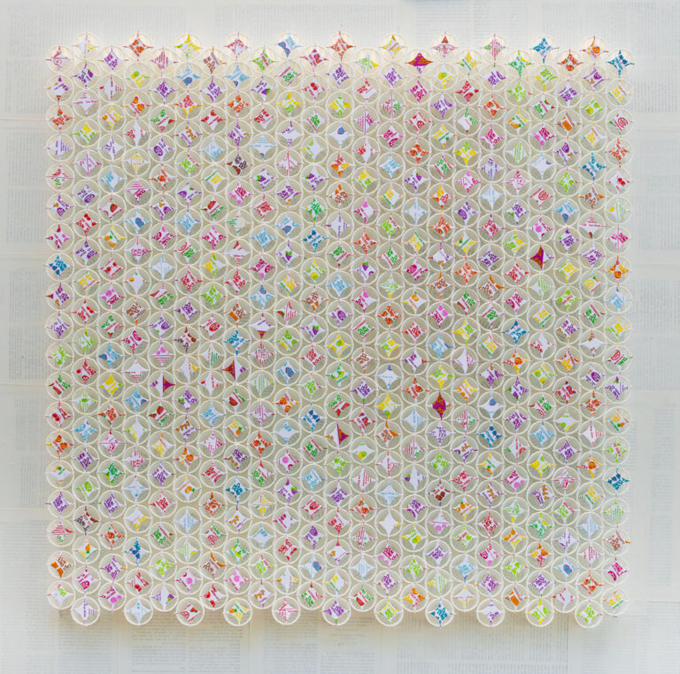 collage of white condiment cups with multi colored but very pale candy box four pointed stars on top of the cups