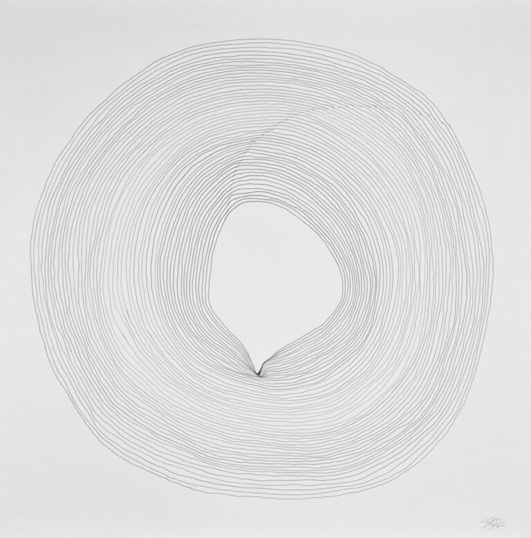 an abstract graphite piece on paper. light lines are drawn in a circular motion. there are imperfections in the round shape adding in a sense of density to areas of the composition