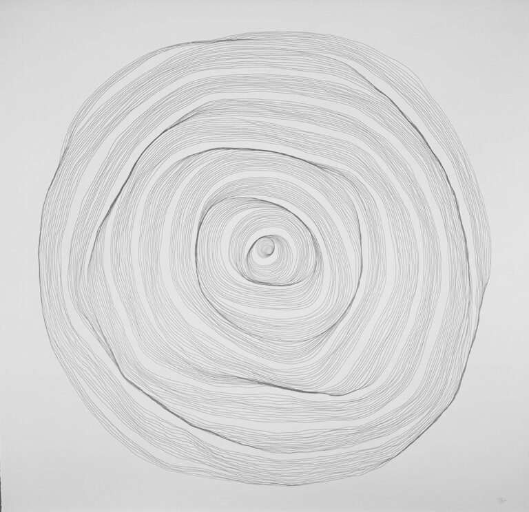 an abstract graphite on paper piece. the rose shaped circle has lines spiraling from the center. there is one non-continuous darker line that also spirals out.